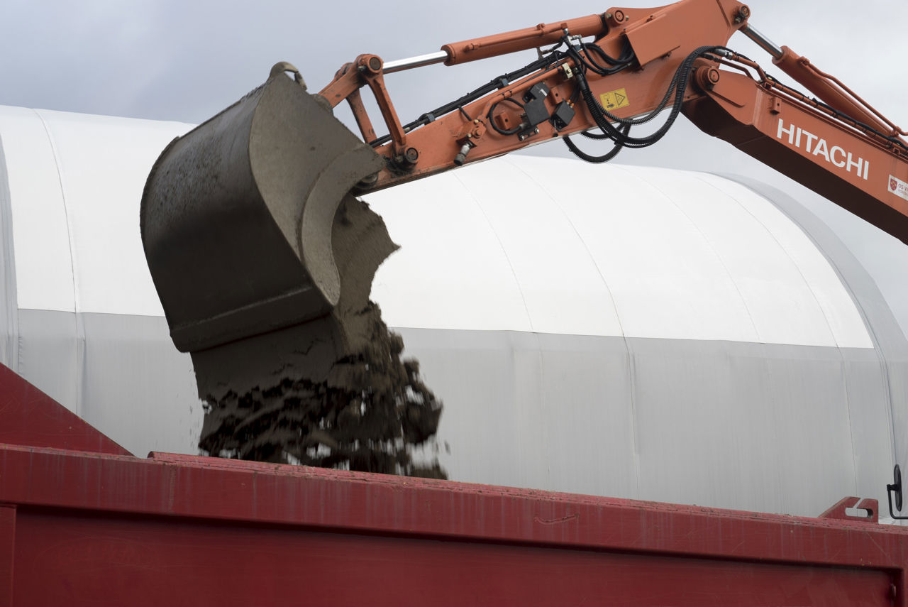 Bilete av gravemaskin arm.